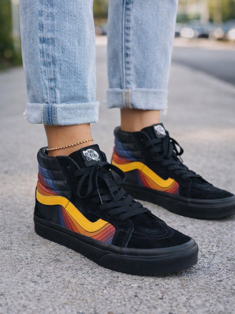 Vans High-Top Sneakers in Black with Yellow and Red Gradient Stripes